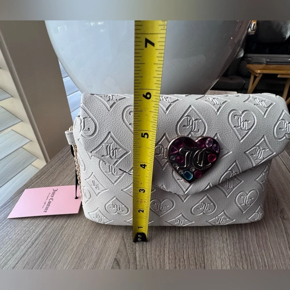 Juicy Couture Cream Embossed Wristlet Clutch with Heart Accent